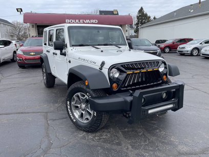 Used 2013 Jeep Wrangler Unlimited Rubicon w/ Dual Top Group
