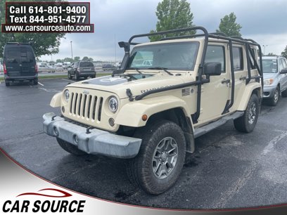 Used 2012 Jeep Wrangler Unlimited Rubicon w/ Dual Top Group