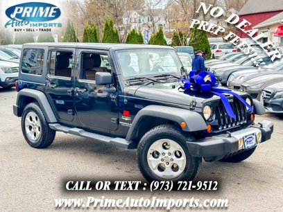Used 2013 Jeep Wrangler Unlimited Sahara w/ Dual Top Group