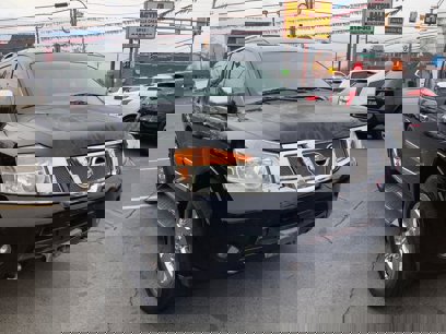 Used 2011 Nissan Armada Platinum w/ 2nd Row Captain Seat Pkg