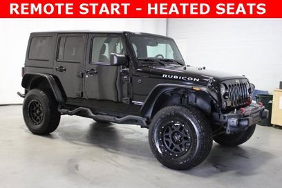 Used 2015 Jeep Wrangler Unlimited Rubicon w/ Dual Top Group