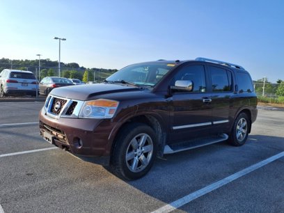 Used 2014 Nissan Armada Platinum w/ 2nd Row Captain Seat Package