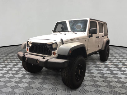 Used 2011 Jeep Wrangler Unlimited Rubicon w/ Dual Top Group