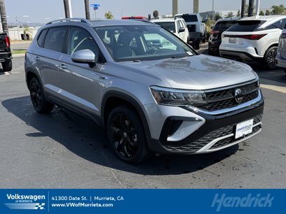 Used 2023 Volkswagen Taos SE w/ Black Wheel Package