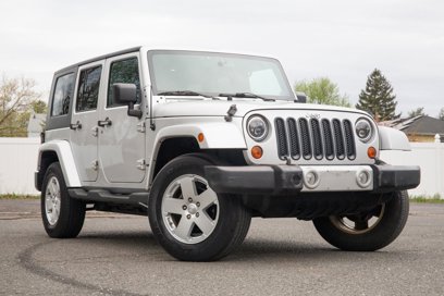 Used 2010 Jeep Wrangler Unlimited Sahara w/ Dual Top Group