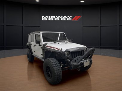 Used 2012 Jeep Wrangler Unlimited Rubicon w/ Dual Top Group