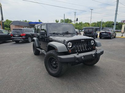 Used 2011 Jeep Wrangler Unlimited Rubicon w/ Dual Top Group
