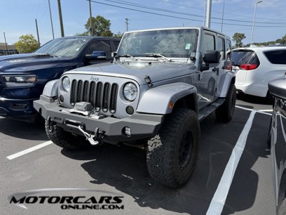 Used 2014 Jeep Wrangler Unlimited Sahara w/ Dual Top Group