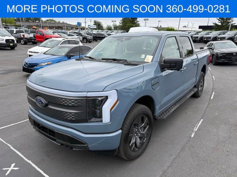 Used 2023 Ford F150 Lightning XLT w/ Equipment Group 312A High image 1